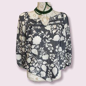 Como Blu women’s soft and light blue and white top size medium.